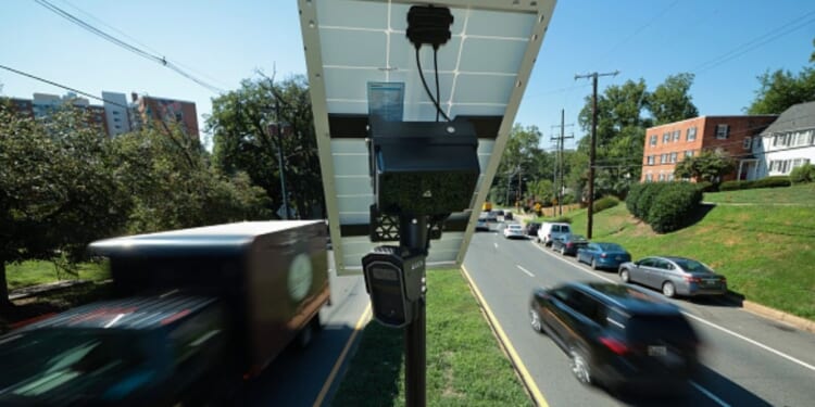 A Flock camera can be viewed above a street in Silver Spring, Maryland on August 19, 2026.