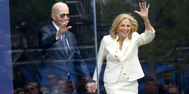 Former First Lady Jill Biden and former President Joe Biden attend the opening ceremony of the Barack Obama Presidential Center in John Lewis Plaza on June 18, 2026 in Chicago.