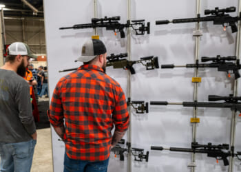 People look at guns and ammunition at the Great American Outdoor Show on Feb. 9, 2024 in Harrisburg, Pennsylvania. (Spencer Platt/Getty Images)