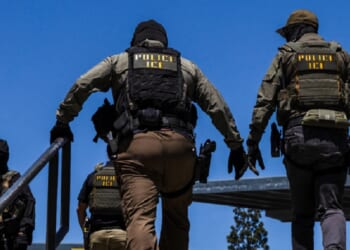 Immigration and Customs Enforcement agents are pictured outside the Ventura County Government Center in Ventura, California, on July 27.