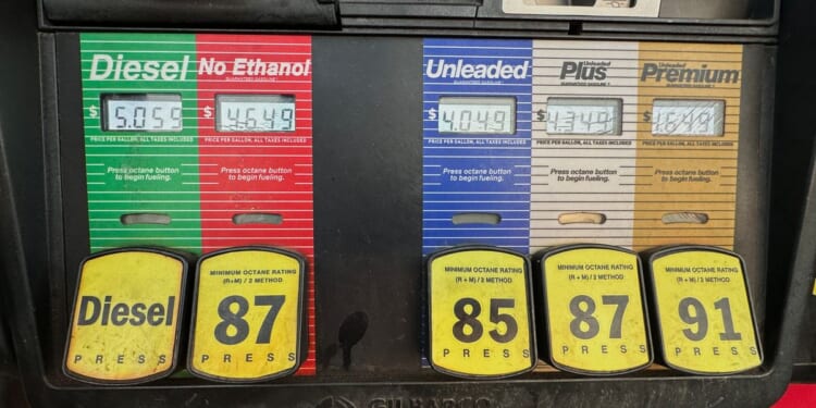 Inflation cooled last month as gas prices fell, though costs remain elevated