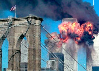 The Twin Towers of the World Trade Center burn before collapsing in the terror attacks of 9/11.