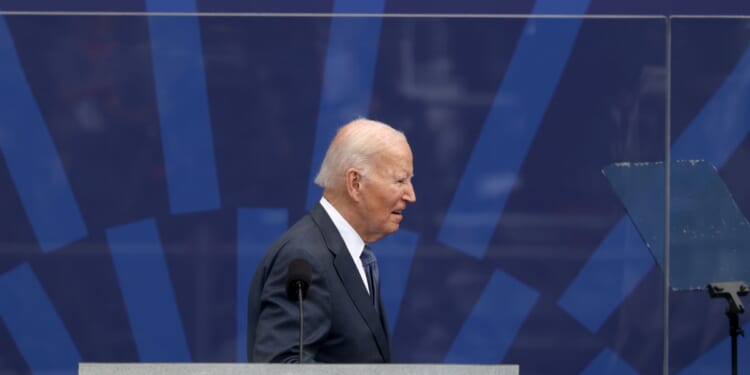 Former President Joe Biden attends the dedication ceremony for the opening of the Barack Obama Presidential Center in John Lewis Plaza on June 18, 2026, in Chicago, Illinois.