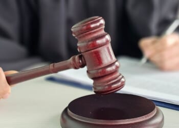 A judge presides over a courtroom.