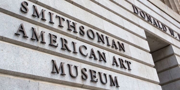 The lettering of the Smithsonian American Art Museum is viewed on the side of a building during the day on July 26, 2026 in Washington, D.C.