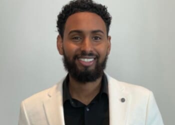 Salman Ahmed Elmi was celebrated as 'Outstanding Refugee' at the same time he was reportedly running fraudulent social services, along with a sex trafficking ring.