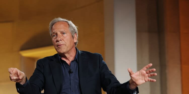 Mike Rowe, the founder of the mikeroweWORKS Foundation, speaks during a panel at the BlackRock Infrastructure Summit on March 11, 2026, in Washington, D.C.