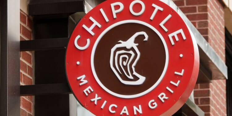 A sign for a local Chipotle location in Washington, DC on July 20, 2026.