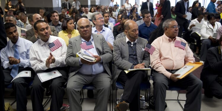 A naturalization ceremony takes place on June 4, 2010, at the U.S. Citizenship and Immigration Services offices of the Federal Building in New York.