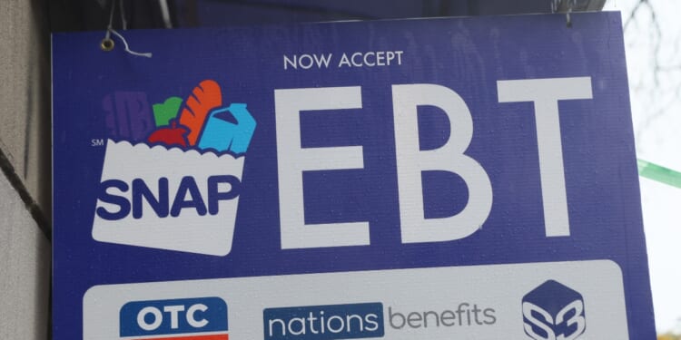 An EBT sign is displayed on the window of a grocery store on Oct. 30, 2025, in the Flatbush neighborhood of the Brooklyn borough in New York City.