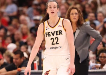 Caitlin Clark #22 of the Indiana Fever is seen with with head coach Stephanie White Saturday during the first half of the game against the Chicago Sky.