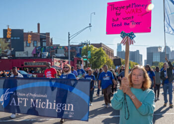 Union members march in Detroit's Labor Day parade.