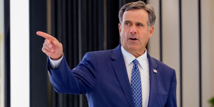 CIA Director John Ratcliffe, seen in a July photo, made an unannounced visit to Moscow earlier this week