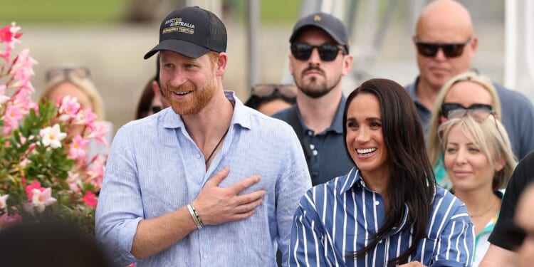 Prince Harry, Duke of Sussex and Meghan, Duchess of Sussex greet members of the public at the Cruising Yacht Club of Australia on April 17, 2026, in Sydney, Australia.