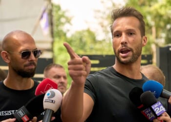 Shackled Tate brothers in court asking to be released from jail during extradition fight