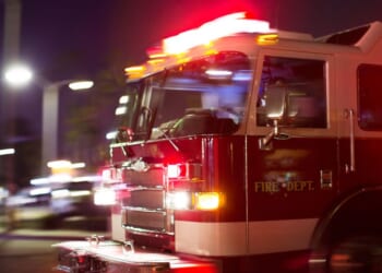 A firetruck races to the scene of an accident.