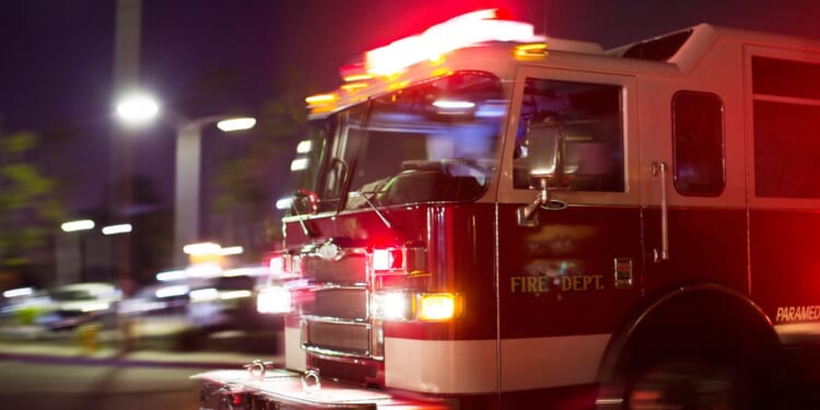A firetruck races to the scene of an accident.