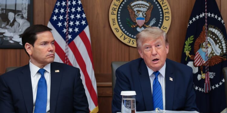 President Donald Trump, pictured with Secretary of State Marco Rubio, left, speaks during a July 31 Cabinet meeting at Camp David, the presidential retreat in Maryland.