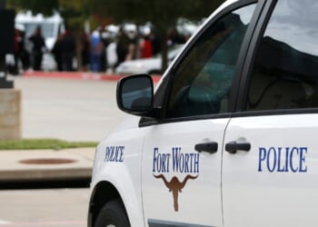 A Fort Worth Police car is parked outside the funeral service for Atatiana Jefferson on Oct. 24, 2019, at Concord Church in Dallas, Texas.