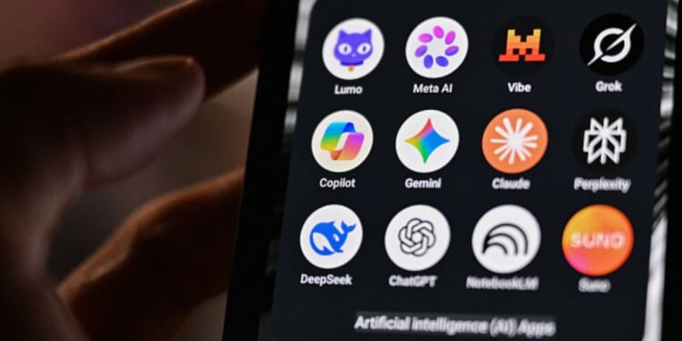 A phone screens displays AI apps in a dimly illuminated space.