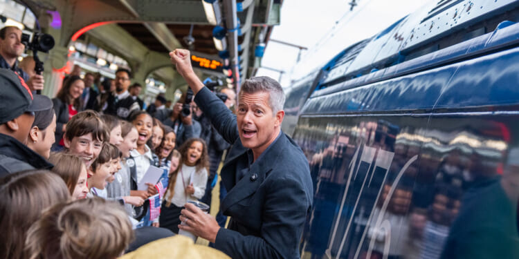 Transportation Secretary Sean Duffy talks with 4th graders before boarding Amtrak's Freedom 250.