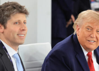 OpenAI CEO Sam Altman sits next to President Donald Trump. (Ludovic Marin/AFP/Getty Images)