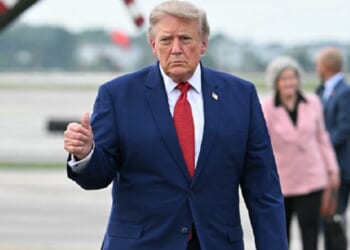 President Donald Trump, pictured flashing a thumbs up in an Aug. 11 file photo at Cleveland's Cleveland Hopkins International Airport.