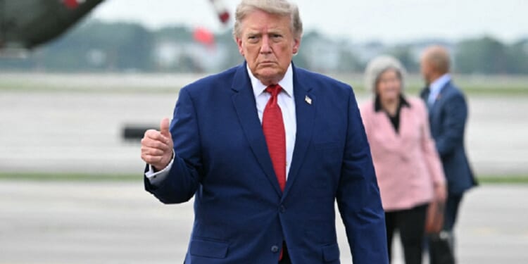 President Donald Trump, pictured flashing a thumbs up in an Aug. 11 file photo at Cleveland's Cleveland Hopkins International Airport.