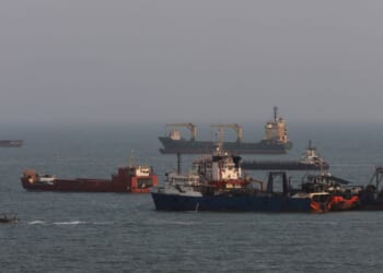 Ships are anchored in the Strait of Hormuz on Aug. 10, 2026, off the coast of Bandar Abbas, Iran.