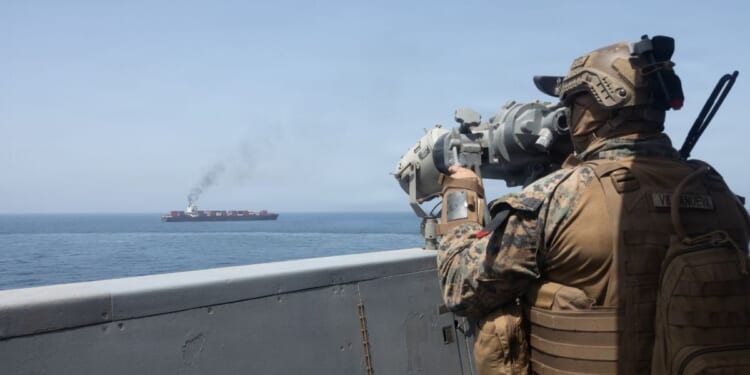 U.S. forces patrol near a naval blockade at the Strait of Hormuz on April 20, 2026.