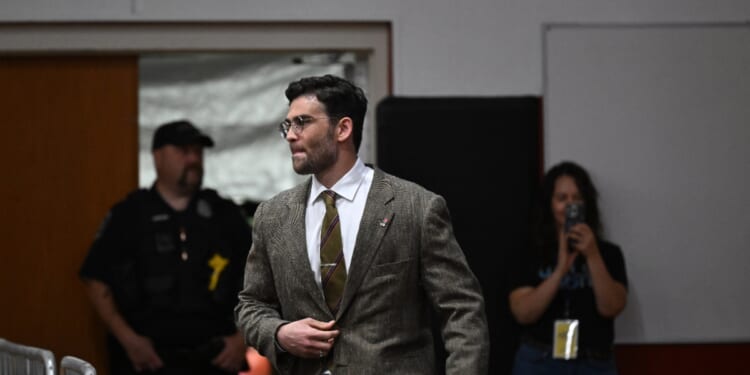 Influencer and left-wing political commentator Hasan Piker is introduced during a campaign rally for Wisconsin gubernatorial candidate Francesca Hong on Aug. 2, 2026, in Milwaukee, Wisconsin.