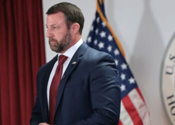 Secretary of Homeland Security Markwayne Mullin stands silently during a press conference at the US Citizenship and Immigration Services field office on Sept. 1, 2026, in New York City.
