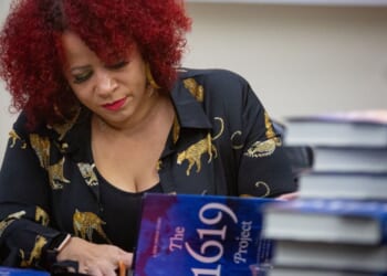Pulitzer Prize-winning leftist journalist Nikole Hannah-Jones signs copies of her book "The 1619 Project" in Los Angeles on Nov. 30, 2021.