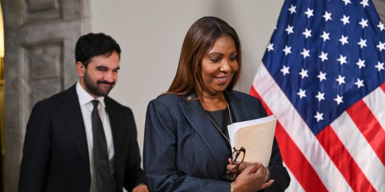 New York City Mayor Zohran Mamdani and New York Attorney General Letitia James arrive for a news conference to announce a lawsuit challenging the federal government's new public charge rule, which could make it harder for immigrants to obtain green cards if they rely on public benefits, at City Hall in New York City on Sept. 14, 2026.