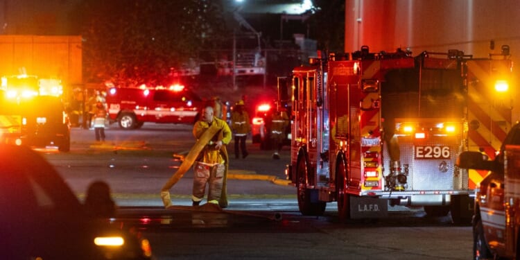 First responders work on the scene after a news helicopter crashed in Chatsworth, a suburban neighborhood of Los Angeles, California, on Sept. 15, 2026.