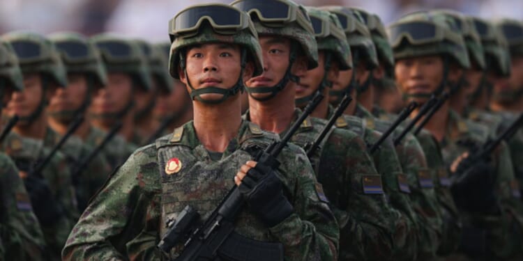 Chinese soldiers are aligned in a military formation in Beijing, China during a parade procession on September 3, 2026.