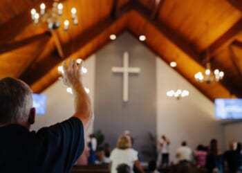 People praise the Lord in a Church.