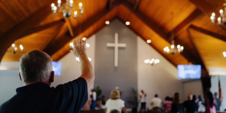 People praise the Lord in a Church.