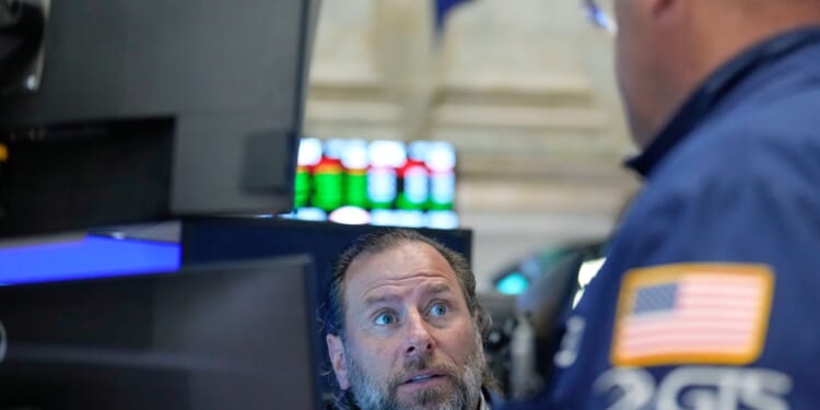 A reprieve from rising oil prices helps U.S. stocks finish the week higher
