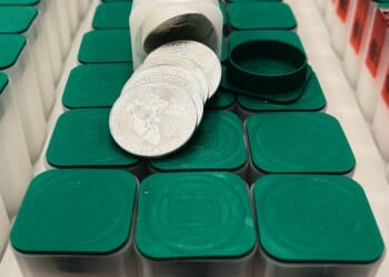 A tip about a swerving van leads police to 66,000 U.S. silver coins in a fraud case