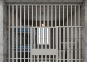 An empty jail cell.