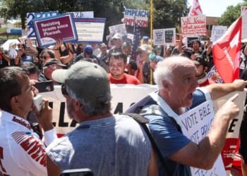 Supporters of President Donald Trump try to interrupt a march by anti-Trump protestors outside the Republican National Committee midterm convention near the American Airlines Center in Dallas, Texas, on Sept. 10, 2026.