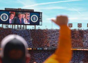 President Donald Trump, Sen. Bill Hagerty, and Sen. Marsha Blackburn appear on a video screen while attending the Texas-Tennessee football game at Neyland Stadium on Sept. 26, 2026, in Knoxville, Tennessee.