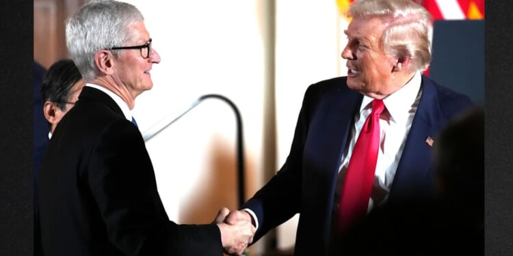President Donald Trump greets Apple CEO Tim Cook during an October 2025 meeting in Tokyo, Japan.