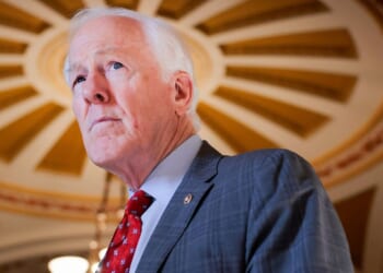 GOP Sen. John Cornyn of Texas speaks with a reporter March 23 in the U.S. Capitol in Washington, D.C.