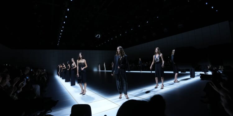 Armani's business and creative evolution on show in Milan a year after founder's death