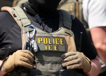 An Immigration and Custom's Enforcement agent stands in Newark, New Jersey, on May 26, 2026.