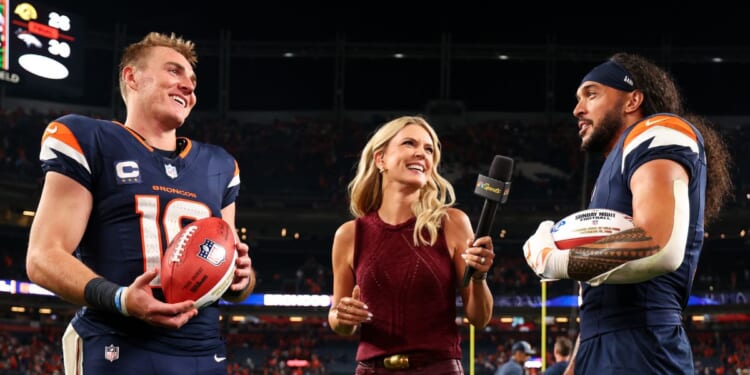 Bo Nix and Talanoa Hufanga of the Denver Broncos are interviewed after winning the game against the Los Angeles Rams at Empower Field at Mile High on Sept. 27, 2026, in Denver, Colorado.