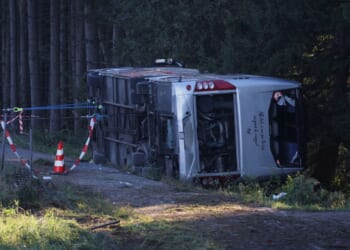 Bus carrying Filipino tourists overturns on way to Germany's Oktoberfest, killing 2