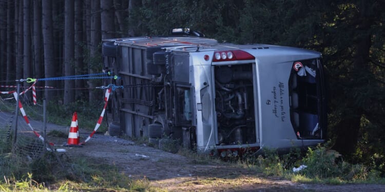 Bus carrying Filipino tourists overturns on way to Germany's Oktoberfest, killing 2